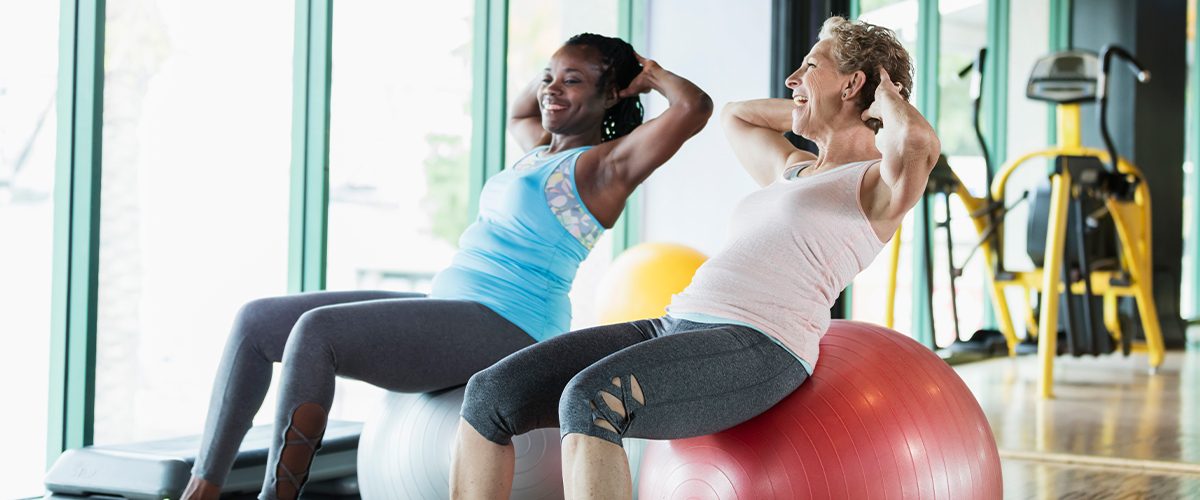 Two senior women working out in their retirement community