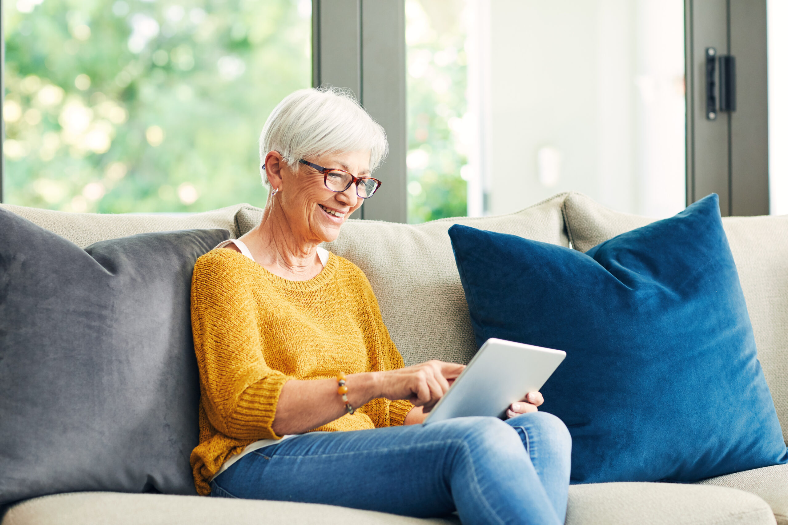 Senior woman on tablet
