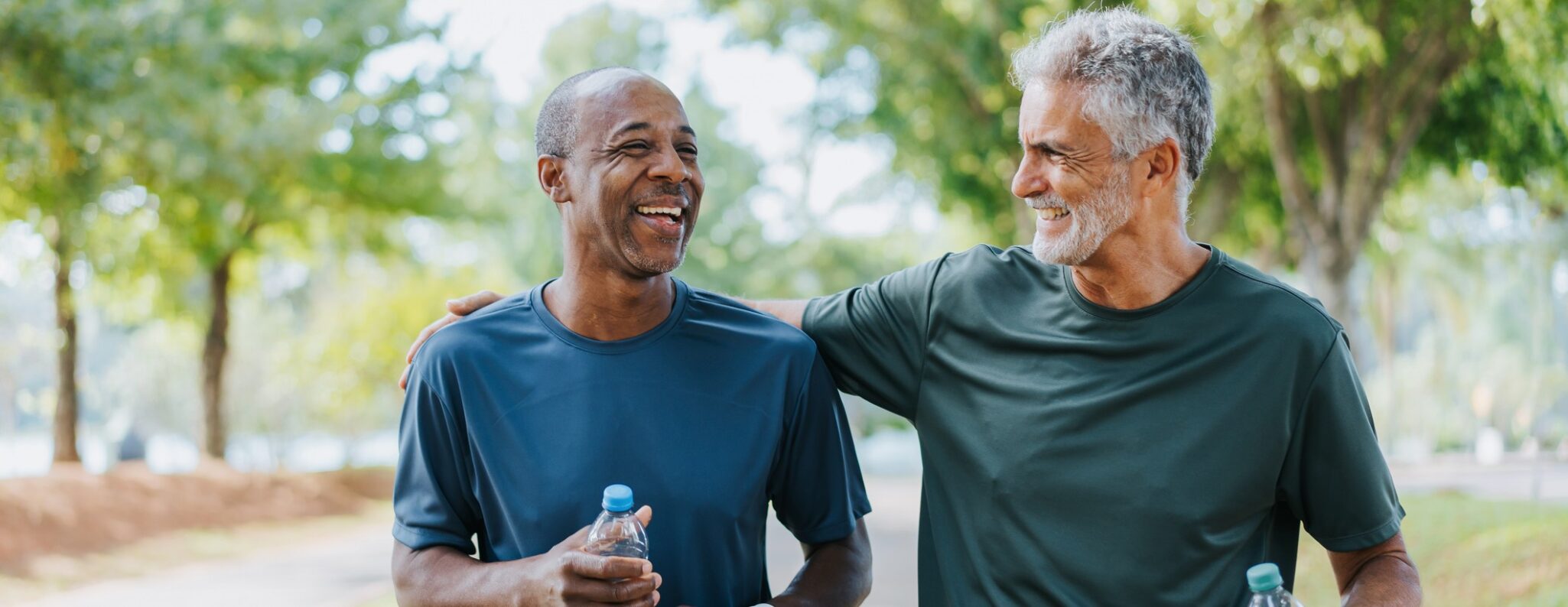 senior friends walking in the park