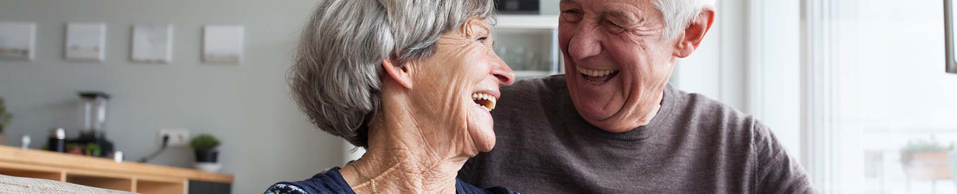 senior couple laughing and smiling